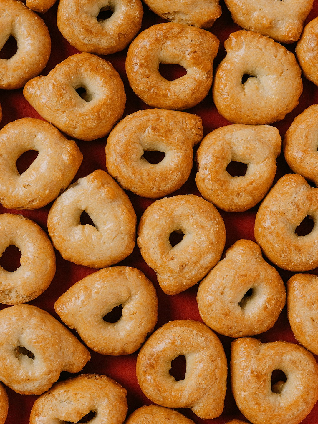 a-bunch-of-donuts-that-are-sitting-on-a-table.jpg A bunch of donuts that are sitting on a table